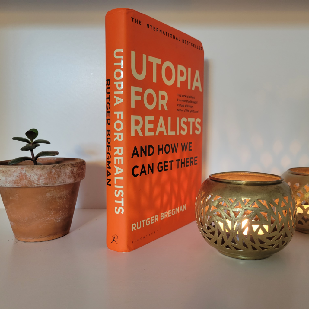 The front cover and spine of Utopia for Realists: How We Can Build the Ideal World by Rutger Bregman